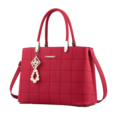 Bright red quilted women's handbag with a structured shape and a dangling pearl and diamond charm.
